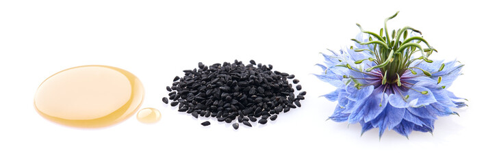 Black cumin oil. Black cumin seeds. Nigella sativa flower.