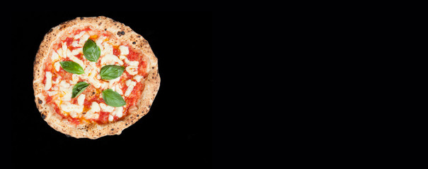 real italian pizza margherita  from the top whit copy space black background