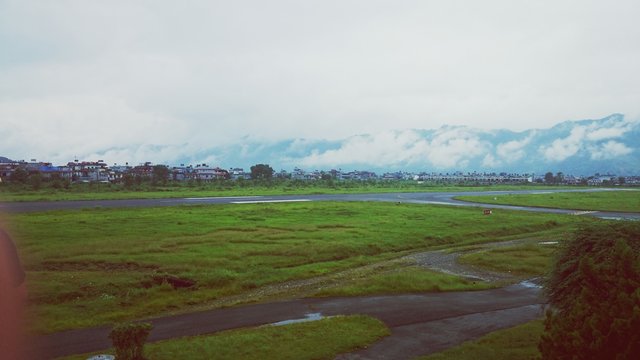 Airfield Partially Overgrown With Grass