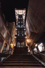 night front view of the old elevator of santa justa in lisbon