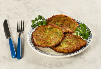 MUCVER. Traditional Zuccini Mucver. Mucver is a Turkish fritter or pancake, made from grated zucchini.