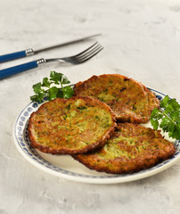 MUCVER. Traditional Zuccini Mucver. Mucver is a Turkish fritter or pancake, made from grated zucchini.