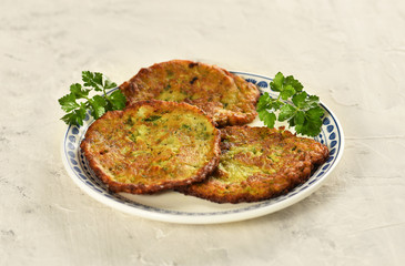 MUCVER. Traditional Zuccini Mucver. Mucver is a Turkish fritter or pancake, made from grated zucchini.