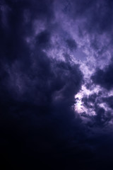 Naklejka na ściany i meble Natural sky composition. Dark ominous blue storm rain clouds. Dramatic sky. Overcast stormy cloudscape. Thunderstorm. Element of apocalypse design.