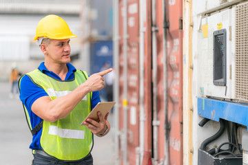 Inspector/Foreman Engineer working on equipment inspection at container yard