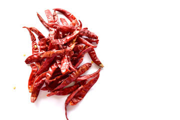 Obraz premium Dried red chillies on a white background