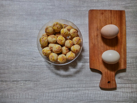 Nastar, Indonesian homemade pineapple tart is pastry filled with pineapple jam served to celebrate Eid al Fitr or Idul Fitri. Nastar is contraction of Dutch ananas and taart