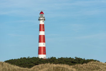 Fototapeta na wymiar Lighthouse of the island of Ameland.