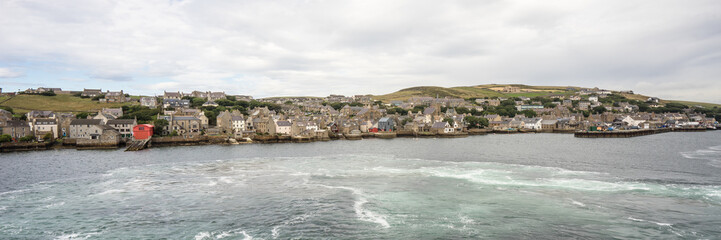 panorama of the historic village Stromness on Orkney mainland, Scotland, Uk. Seaside view of this...