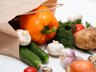 fresh vegetables on a white background. the concept of healthy food. red bell pepper, garlic, potatoes, eggs and pasta on a white background