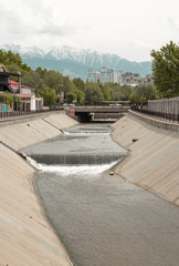 cityscape river in the middle of the city