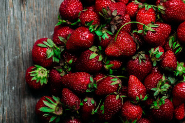 Strawberry closeup on a wooden table