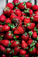 Strawberry closeup on a wooden table