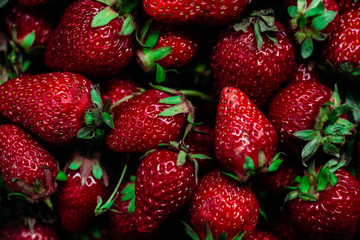 Strawberry closeup on a wooden table