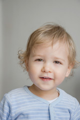 Fototapeta premium Happy sweet little baby boy portrait on white background