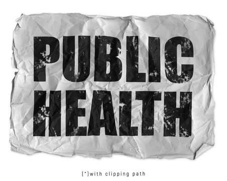 Public health concept (text) on a crumpled and damaged piece of breaking paper. Isolated image with clipping path to remove and replace background easily.