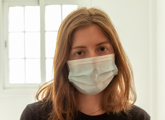 white blonde woman with face mask isolated