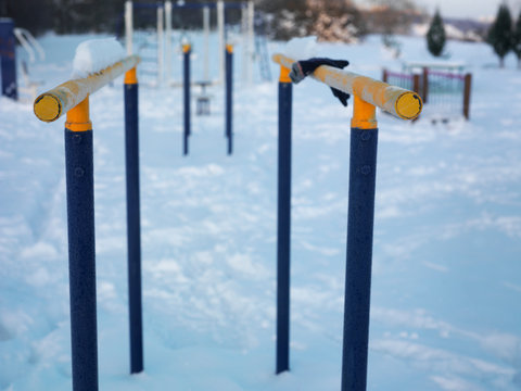 Parallel bars covered with frost