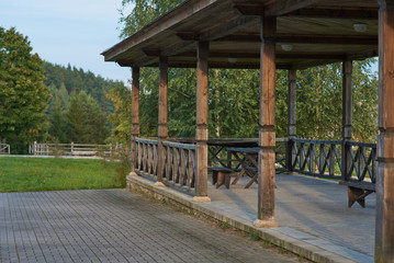 Empty cafe wooden gazebo in the Park. Ban on visiting public places due to threat of coronavirus.