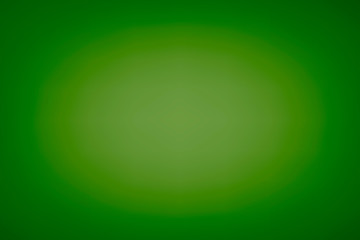 Abstract green background with a Central gradient.The color of the foliage.Vector illustration.