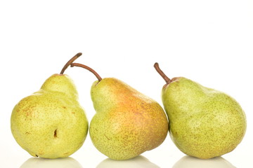 Juicy ripe, sweet, organic green pears, closeup, on a white background.