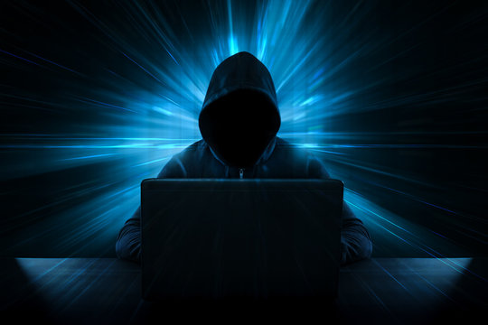 Male thief stealing data from computer - Cyber Crime Concept