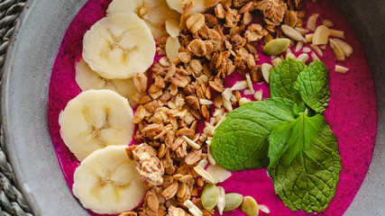 Tropical fruit smoothie bowl top view. Healthy food. Vegetarian dish