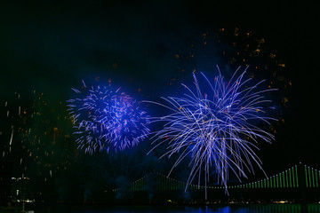 Colorful fireworks and Gwangan Bridge in Busan City , South Korea.
