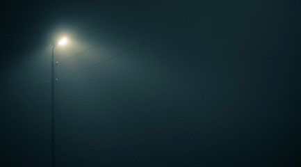 Lonely lantern. Night. Fog.