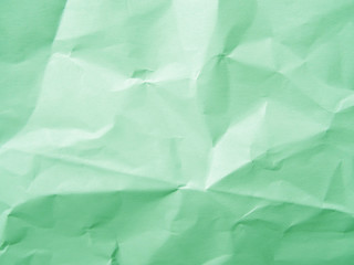 Mint green crumpled paper texture background