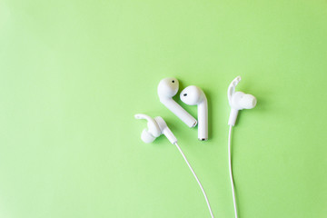 White headphones for talking and listening to music. 