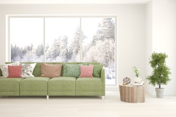 White living room with green sofa and winter landscape in window. Scandinavian interior design. 3D illustration