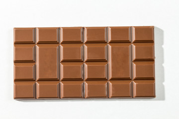Milk chocolate bar isolated