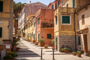 Old Italian picturesque houses. Historic center of the ancient village of Marina di Campo on the Island of Elba in Italy in the Tuscany region.