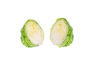 Two Half Green Head of young cabbage on a white isolate background.
