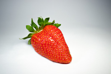 Strawberry isolated, white clipping path, with green leaf, closeRed fresh strawberry with green leafs, close viewup, macro photo