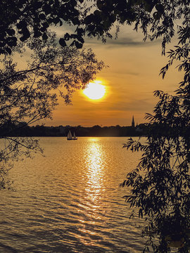 Beauty Sunset Hamburg city Alster with boot 