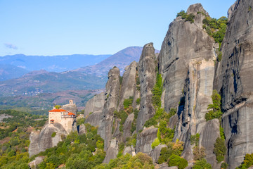 Fototapeta na wymiar Mountain Wall and Monastery on the Cliff