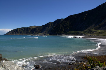 Fototapeta na wymiar Amazing Red Rocks wild beach, Owhiro Bay, near Wellington City,New Zealand