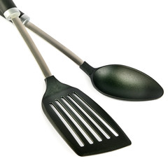 Kitchen spoon and spatula on isolated white background.