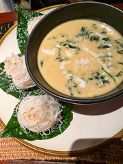 typical thai food, soup, Phat Thai, noodles and vegetables,  in the luxury Restaurant of the surin Phuket, Thailand