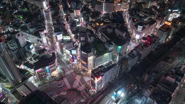 TOKYO, JAPAN: Aerial shot of Shibuya crossing at night, 4K time-lapse.