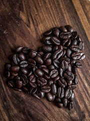 coffee beans on wooden background