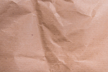 Fototapeta premium Brown crumpled packaging paper textured background
