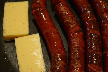 sausages on a grill