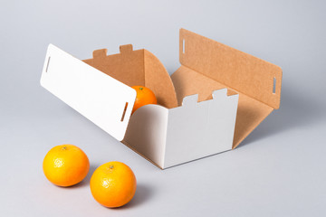 White carton cake box with cover on grey background