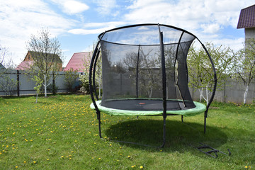 Trampoline on the background of nature.