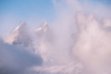 Foggy And Snowy Peak Ushba In The Clouds