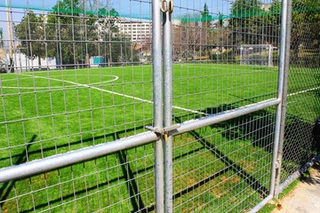 Athens, Greece, March 21 2020 - Closed 5 x 5 soccer field stadium due to coronavirus lockdown.