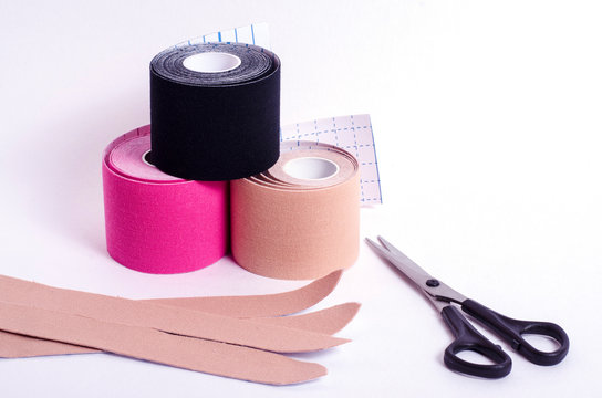Special physical multi-colored teips for taping muscles during sports and other injuries. Kinesiological taping of athletes. Rehabilitation